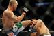 Jul 27, 2013; Seattle, WA, USA; Robbie Lawler (red tape) lands a kick to the head of Bobby Voelker (blue tape) during their welterweight bout at Key Arena. Lawler won by a TKO in the second round. Mandatory Credit: Jayne Kamin-Oncea-USA TODAY Sports