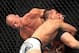 Aug 28, 2013; Indianapolis, IN, USA; Donald Cerrone (left) fights Rafael dos Anjos during a UFC match at Bankers Life Fieldhouse. Mandatory Credit: Pat Lovell-USA TODAY Sports