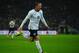 LONDON, ENGLAND - OCTOBER 15: Wayne Rooney of England celebrates after scoring his team's opening goal during the FIFA 2014 World Cup Qualifying Group H match between England and Poland at Wembley Stadium on October 15, 2013 in London, England. (Photo b