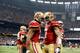 NEW ORLEANS, LA - FEBRUARY 03: Colin Kaepernick #7 of the San Francisco 49ers celebrates with teammate Michael Crabtree after a touchdown was scored against the Baltimore Ravens during Super Bowl XLVII at the Mercedes-Benz Superdome on February 3, 2013