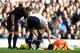 LIVERPOOL, ENGLAND - NOVEMBER 03: Hugo Lloris of Tottenham Hotspur lies injured during the Barclays Premier League match between Everton and Tottenham Hotspur at Goodison Park on November 03, 2013 in Liverpool, England. (Photo by Chris Brunskill/Getty Ima