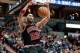 Mar 24, 2013; Minneapolis, MN, USA; Chicago Bulls power forward Taj Gibson (22) dunks against the Minnesota Timberwolves in the second quarter at Target Center. Bulls won 104-97. Mandatory Credit: Greg Smith-USA TODAY Sports
