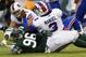 EAST RUTHERFORD, NJ - SEPTEMBER 22: Defensive end Muhammad Wilkerson #96 of the New York Jets sacks quarterback EJ Manuel #3 of the Buffalo Bills during the second quarter in a game at MetLife Stadium on September 22, 2013 in East Rutherford, New Jersey.
