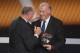 ZURICH, SWITZERLAND - JANUARY 07: Vicente del Bosque, head coach of Spain receives the FIFA World Coach of Men's Football 2012 trophy by Felipe Scolari (L) at Congress House on January 7, 2013 in Zurich, Switzerland. (Photo by Christof Koepsel/Getty Ima