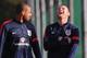 ST ALBANS, ENGLAND - NOVEMBER 13: England players Wayne Rooney and Glen Johnson share a joke during an England Training Session at London Colney on November 13, 2013 in St Albans, England. (Photo by Mike Hewitt/Getty Images)