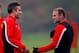 MANCHESTER, ENGLAND - OCTOBER 01: Wayne Rooney (R) and Robin van Persie of Manchester United talk during a training session ahead of their Champions League Group A match against Shakhtar Donetsk at their Carrington Training Complex on October 01, 2013 in