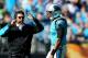 CHARLOTTE, NC - NOVEMBER 03: Head coach Ron Rivera of the Carolina Panthers watches on as Cam Newton #1 walks over to talk during their game against the Atlanta Falcons at Bank of America Stadium on November 3, 2013 in Charlotte, North Carolina. (Photo