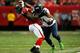 ATLANTA, GA - NOVEMBER 10: Marshawn Lynch #24 of the Seattle Seahawks stiff arms William Moore #25 of the Atlanta Falcons at Georgia Dome on November 10, 2013 in Atlanta, Georgia. (Photo by Kevin C. Cox/Getty Images)