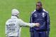 MILAN, ITALY - NOVEMBER 14: Head coach Italy Cesare Prandelli speaks to Mario Balotelli during a training session ahead of their international friendly match against Germany at Giuseppe Meazza Stadium on November 14, 2013 in Milan, Italy. (Photo by Clau