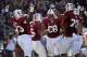 Oct 19, 2013; Stanford, CA, USA; Stanford Cardinal players celebrate in end zone after running back Tyler Gaffney (25) scored a touchdown during the fourth quarter against the UCLA Bruins at Stanford Stadium. Stanford won 24-10. Mandatory Credit: Bob Sta