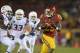 Oct 10, 2013; Los Angeles, CA, USA; Southern California Trojans tailback Tre Madden (23) is pursued by Arizona Wildcats cornerback Jonathan McKnight (6) on a 62-yard touchdown reception in the first quarter at Los Angeles Memorial Coliseum. Mandatory Cred