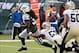 Nov 3, 2013; East Rutherford, NJ, USA; New York Jets running back Chris Ivory (33) scores a touchdown past New Orleans Saints outside linebacker David Hawthorne (57) in the first half during the game at MetLife Stadium. Mandatory Credit: Robert Deutsch-US