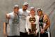 CLEVELAND - JUNE 14: (L-R) Manu Ginobili #20, Tim Duncan #21, head coach Gregg Popovich and Finals MVP Tony Parker #9 of the San Antonio Spurs pose for a photo with the Larry O'Brien Championship trophy after they won the 2007 NBA Championship with their