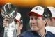 HOUSTON, TX - FEBRUARY 1: Head coach Bill Belichick of the New England Patriots holds the Lombardi trophy after defeating the Carolina Panthers 32-29 in Super Bowl XXXVIII at Reliant Stadium on February 1, 2004 in Houston, Texas. (Photo by Andy Lyons/Get
