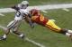 AMES, IA- OCTOBER 13: Running back John Hubert #33 of the Kansas State Wildcats is brought down during the second quarter by linebacker Jeremiah George #52 of the Iowa State Cyclones on October 13, 2012 at Jack Trice Stadium in Ames, Iowa. Kansas State