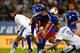 ATHENS, GREECE - OCTOBER 15: Kostas Mitroglou (R) and his team mate Giorgos Samaras (L) of Greece battle for the ball with Andreas Christen of Liechtenstein during the group G FIFA 2014 World Cup Qualifier match between Greece and Liechtenstein at Karaisk