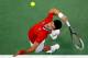 BELGRADE, SERBIA - NOVEMBER 15: Novak Djokovic of Serbia serves the ball to Radek Stepanek of Czech Republic during the day one of the final Davis Cup match between Serbia and Czech Republic at Kombank Arena on November 15, 2013 in Belgrade, Serbia. (Phot