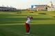 DUBAI, UNITED ARAB EMIRATES - NOVEMBER 16: Ian Poulter of England plays his second shot on the 18th hole during the third round of the DP World Tour Championship, Dubai on the Earth Course at Jumeirah Golf Estates on November 16, 2013 in Dubai, United Ar