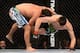 Mar 16, 2013; Montreal, Quebec, CAN; Johny Hendricks (blue) takes Carlos Condit (red) down to the mat during their main card bout at UFC 158 at the Bell Centre. Mandatory Credit: Eric Bolte-USA TODAY Sports
