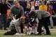 MINNEAPOLIS, MN - DECEMBER 05: Brett Favre #4 of the Minnesota Vikings is assisted by medical staff against the Buffalo Bills defense at the Mall of America Field at the Hubert H. Humphrey Metrodome on December 5, 2010 in Minneapolis, Minnesota. (Photo