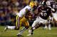 BATON ROUGE, LA - NOVEMBER 10: Odell Beckham #3 of the LSU Tigers runs past Benardrick McKinney #50 of the Mississippi State Bulldogs at Tiger Stadium on November 10, 2012 in Baton Rouge, Louisiana. The Tigers defeated the Bulldogs 37-17. (Photo by Ch