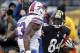 Nov 10, 2013; Pittsburgh, PA, USA; Pittsburgh Steelers wide receiver Antonio Brown (84) returns a punt as Buffalo Bills outside linebacker Nigel Bradham (53) defends during the fourth quarter at Heinz Field. The Pittsburgh Steelers won 23-10. Mandatory C