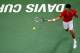 BELGRADE, SERBIA - NOVEMBER 15: Novak Djokovic of Serbia plays a forehand against Radek Stepanek of Czech Republic during the day one of the final Davis Cup match between Serbia and Czech Republic at Kombank Arena on November 15, 2013 in Belgrade, Serbia.