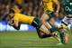 DUBLIN, IRELAND - NOVEMBER 16: Quade Cooper of Australia scores a try during the International match between Ireland and Australia at Aviva Stadium on November 16, 2013 in Dublin, Ireland. (Photo by Ian Walton/Getty Images)