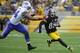 PITTSBURGH, PA - NOVEMBER 10: Emmanuel Sanders #88 of the Pittsburgh Steelers is chased by Mario Williams #94 of the Buffalo Bills during the second quarter at Heinz Field on November 10, 2013 in Pittsburgh, Pennsylvania. (Photo by Vincent Pugliese/Getty