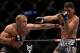 Mar 16, 2013; Montreal, Quebec, CAN; Georges St.Pierre (red) and Nick Diaz (blue) throw simultaneous punches during their Welterweight title bout at UFC 158 at the Bell Centre. Mandatory Credit: Eric Bolte-USA TODAY Sports