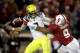 PALO ALTO, CA - NOVEMBER 07: Marcus Mariota #8 of the Oregon Ducks fumbles the ball when pressured by James Vaughters #9 of the Stanford Cardinal in the fourth period at Stanford Stadium on November 7, 2013 in Palo Alto, California. (Photo by Ezra Shaw/