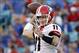 Nov 2, 2013; Jacksonville, FL, USA; Georgia Bulldogs quarterback Aaron Murray (11) reacts as he throws the ball against the Florida Gators during the second half at EverBank Field. Georgia Bulldogs defeated the Florida Gators 23-20. Mandatory Credit: Kim