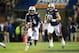 AUBURN, AL - OCTOBER 26: Quarterback Nick Marshall #14 of the Auburn Tigers runs the ball downfield during their game against the Florida Atlantic Owls on October 26, 2013 at Jordan-Hare Stadium in Auburn, Alabama. At the end of the first quarter Auburn