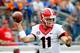 JACKSONVILLE, FL - NOVEMBER 02: Aaron Murray #11 of the Georgia Bulldogs attempts a pass during the game against the Florida Gators at EverBank Field on November 2, 2013 in Jacksonville, Florida. (Photo by Sam Greenwood/Getty Images)