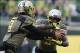 Nov 16, 2013; Eugene, OR, USA; Oregon Ducks quarterback Marcus Mariota (8) hands the ball off to Oregon Ducks running back Byron Marshall (9) against the Utah Utes at Autzen Stadium. The Ducks won 44-21. Mandatory Credit: Scott Olmos-USA TODAY Sports