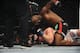Nov 16, 2013; Las Vegas, NV, USA; Rashad Evans (red gloves) fights against Chael Sonnen (blue gloves) in their light heavyweight bout during UFC 167 at MGM Grand Garden Arena. Mandatory Credit: Stephen R. Sylvanie-USA TODAY Sports