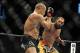 Nov 16, 2013; Las Vegas, NV, USA; Georges St-Pierre (red gloves) fights against Johny Hendricks (blue gloves) in their welterweight championship bout during UFC 167 at MGM Grand Garden Arena. Mandatory Credit: Stephen R. Sylvanie-USA TODAY Sports