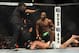 Nov 16, 2013; Las Vegas, NV, USA; Rashad Evans (red gloves) fights against Chael Sonnen (blue gloves) in their light heavyweight bout during UFC 167 at MGM Grand Garden Arena. Mandatory Credit: Stephen R. Sylvanie-USA TODAY Sports