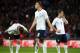 LONDON, ENGLAND - NOVEMBER 15: (L-R) James Milner, Phil Jones and Jack Wilshere of England look thoughtful during the international friendly match between England and Chile at Wembley Stadium on November 15, 2013 in London, England. (Photo by Clive Brun