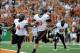 Nov 16, 2013; Austin, TX, USA; Oklahoma State Cowboys quarterback Clint Chelf (10) scores a touchdown against the Texas Longhorns during the first quarter at Darrell K Royal-Texas Memorial Stadium. Mandatory Credit: Brendan Maloney-USA TODAY Sports
