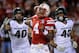 LINCOLN, NE - NOVEMBER 16: Quarterback Tommy Armstrong Jr. #4 of the Nebraska Cornhuskers runs from linebacker Ed Davis #43 of the Michigan State Spartans and linebacker Max Bullough #40 of the Michigan State Spartans during their game at Memorial Stadium