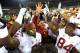 CORVALLIS, OR - NOVEMBER 01: Head coach Ed Orgeron of the USC Trojans celebrates with his team after they beat the Oregon State Beavers at Reser Stadium on November 1, 2013 in Corvallis, Oregon. USC won the game 31-14. (Photo by Steve Dykes/Getty Images)