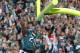 PHILADELPHIA, PA - NOVEMBER 17: Running back LeSean McCoy #25 of the Philadelphia Eagles dunks the ball over the cross bar after scoring a second quarter touchdown against the Washington Redskins during a game at Lincoln Financial Field on November 17, 20
