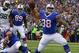 Nov 17, 2013; Orchard Park, NY, USA; Buffalo Bills fullback Frank Summers (38) runs the ball in for a touchdown during the first half against the New York Jets at Ralph Wilson Stadium. Mandatory Credit: Timothy T. Ludwig-USA TODAY Sports