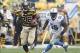 Nov 17, 2013; Pittsburgh, PA, USA; Pittsburgh Steelers running back Le'Veon Bell (26) runs with the ball past Detroit Lions middle linebacker Stephen Tulloch (55) during the second quarter at Heinz Field. Mandatory Credit: Charles LeClaire-USA TODAY Sport