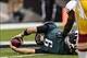 Nov 17, 2013; Philadelphia, PA, USA; Philadelphia Eagles quarterback Nick Foles (9) scores a touchdown during the first quarter against the Washington Redskins at Lincoln Financial Field. Mandatory Credit: Howard Smith-USA TODAY Sports