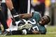 Nov 17, 2013; Philadelphia, PA, USA; Philadelphia Eagles running back LeSean McCoy (25) holds his leg after being injured on a play during the second quarter against the Washington Redskins at Lincoln Financial Field. Mandatory Credit: Howard Smith-USA TO