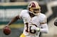 Nov 17, 2013; Philadelphia, PA, USA; Washington Redskins quarterback Robert Griffin III (10) rolls out during the first quarter against the Philadelphia Eagles at Lincoln Financial Field. Mandatory Credit: Howard Smith-USA TODAY Sports