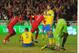 LISBON, PORTUGAL - NOVEMBER 15: Martin Olsson and Per Nilsson of Sweden show their dejection as Cristiano Ronaldo of Portugal turns away to celebrate after scoring during the FIFA 2014 World Cup Qualifier Play-off First Leg between Portugal and Sweden at