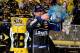 HOMESTEAD, FL - NOVEMBER 17: Jimmie Johnson, driver of the #48 Lowe's/Kobalt Tools Chevrolet, celebrates in Champions Victory Lane after winning the series championship following the NASCAR Sprint Cup Series Ford EcoBoost 400 at Homestead-Miami Speedway
